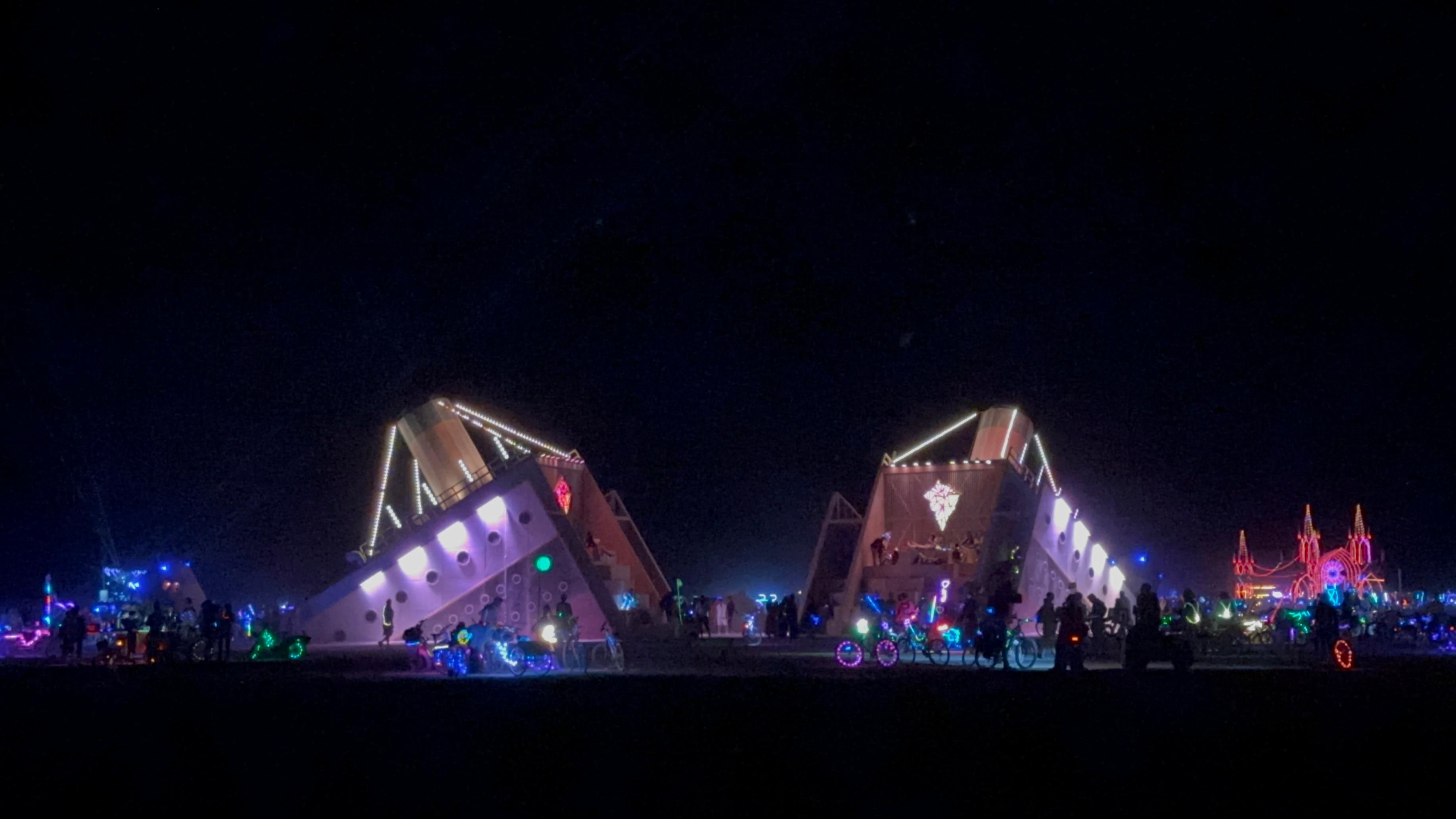 Titanic's End illuminated at night at Burning Man 2026